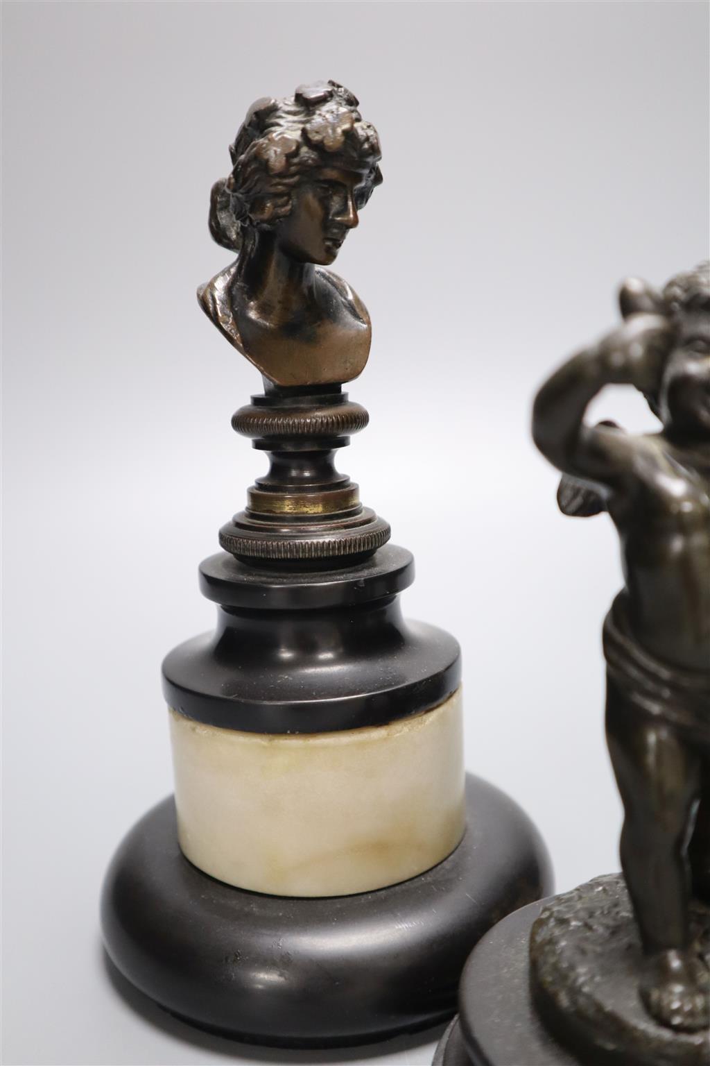 A pair of Regency small bronze busts and a pair of figures of cherubs, tallest 16cm